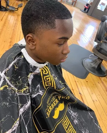 https://bombshellbarbers.com/wp-content/uploads/2025/05/normal-boy.webp